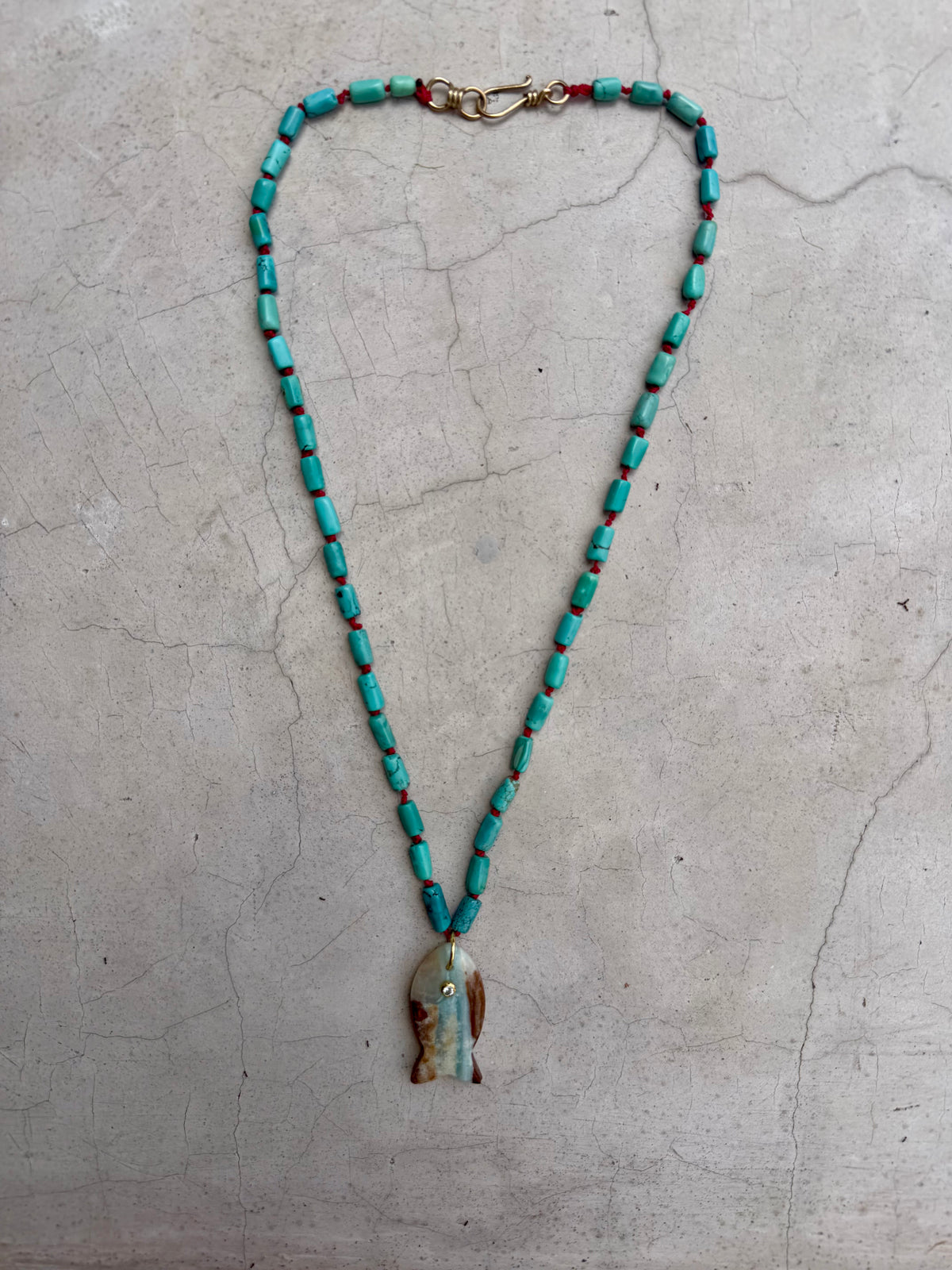 Turquoise Necklace with Stone Fish Pendant