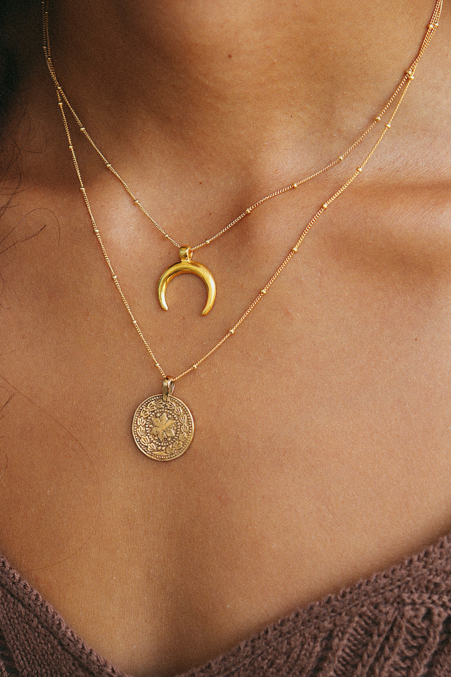 Bronze Moon and Sun necklace styled on model