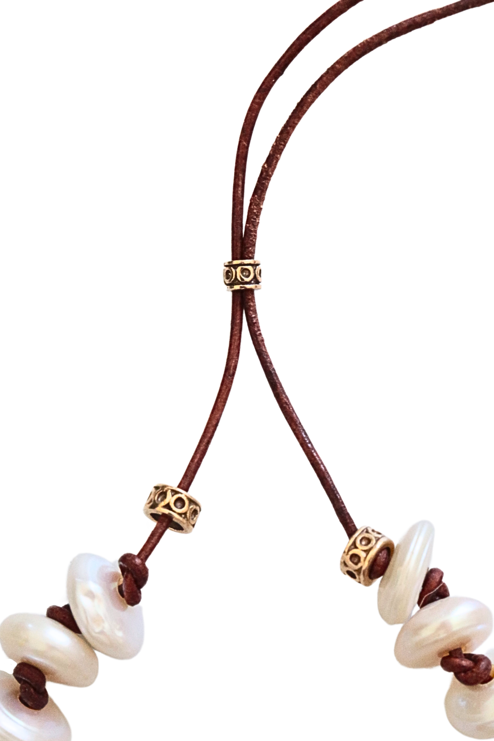 Close-up of bead slider to adjust necklace length