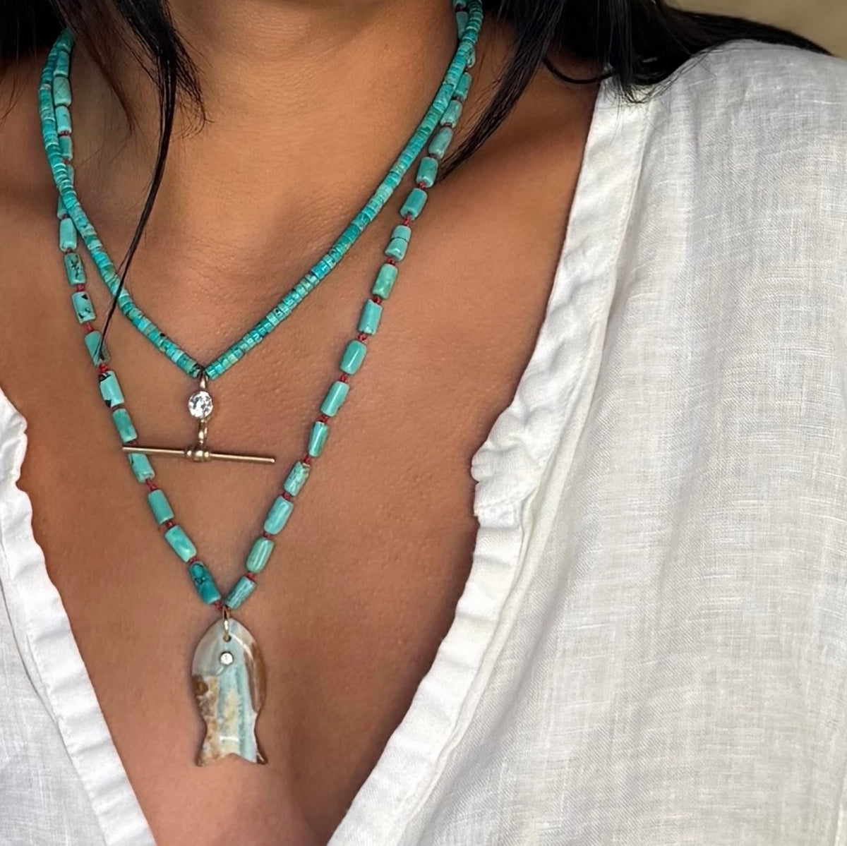 Turquoise Necklace with Stone Fish Pendant