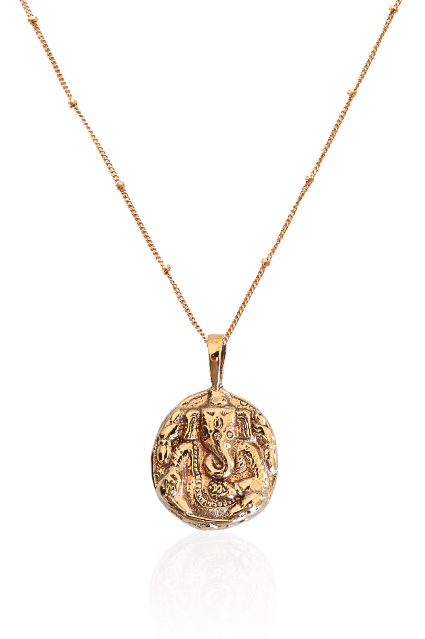 Ganesha Necklace in gold with 1" bronze pendant displayed on neutral background