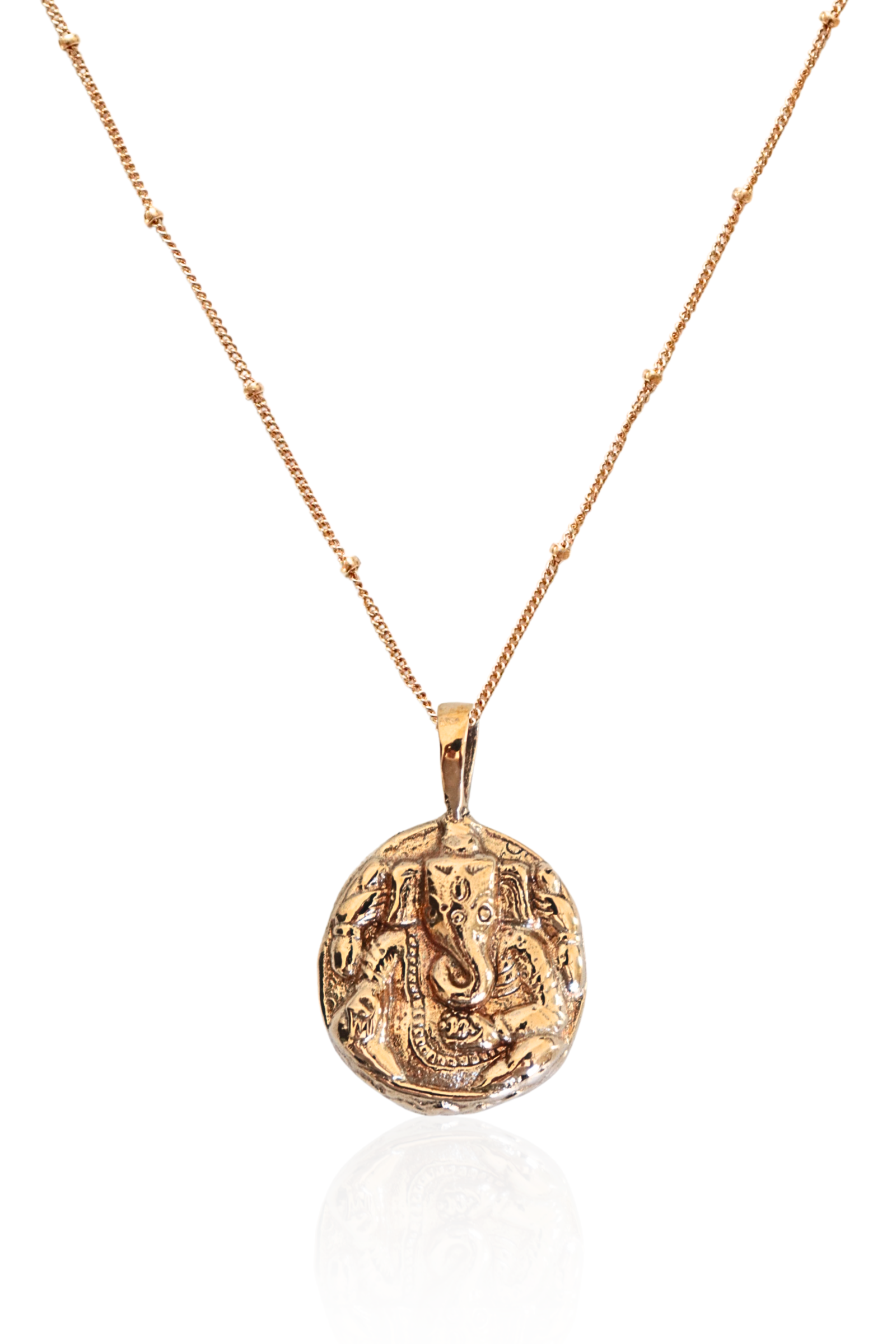 Ganesha Necklace in gold with 1" bronze pendant displayed on neutral background