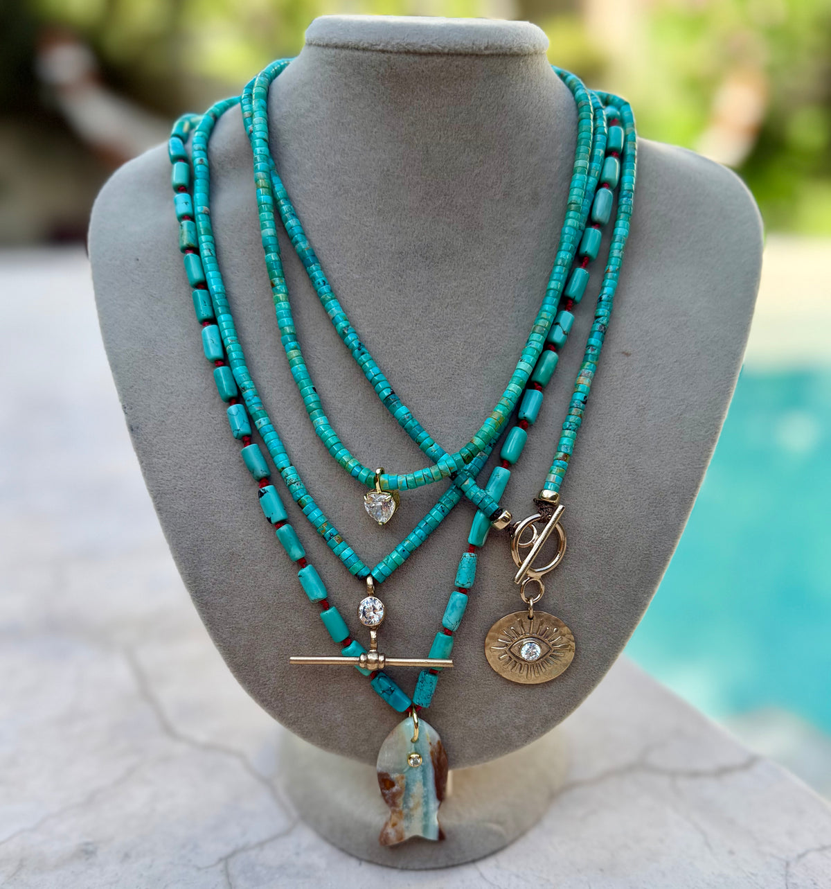 Turquoise Necklace with Stone Fish Pendant