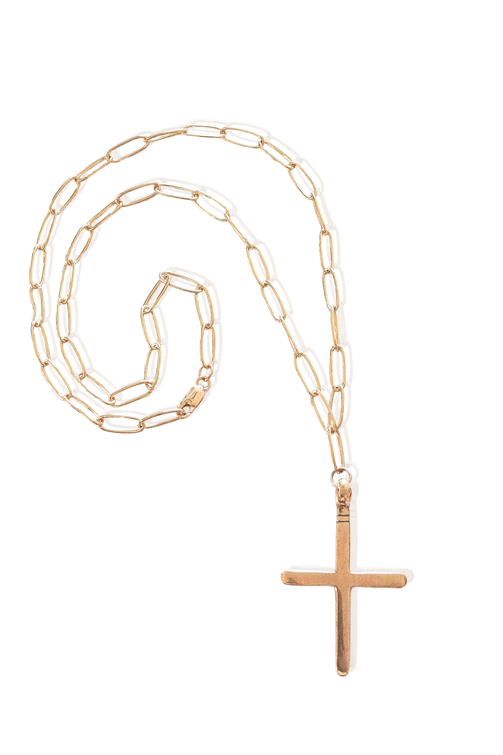 Close-up of gold cross pendant on 14K gold-plated chain