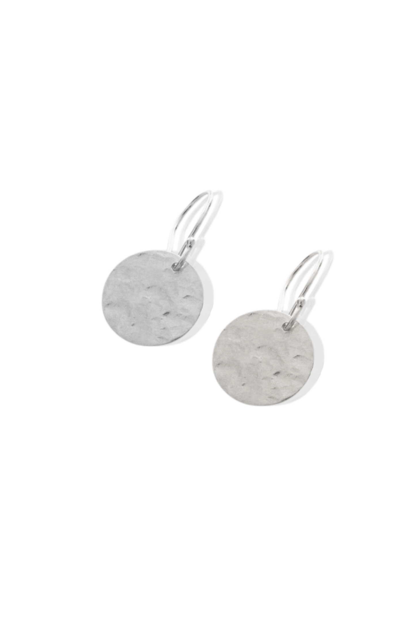 Hand-hammered silver disc earrings displayed on neutral background