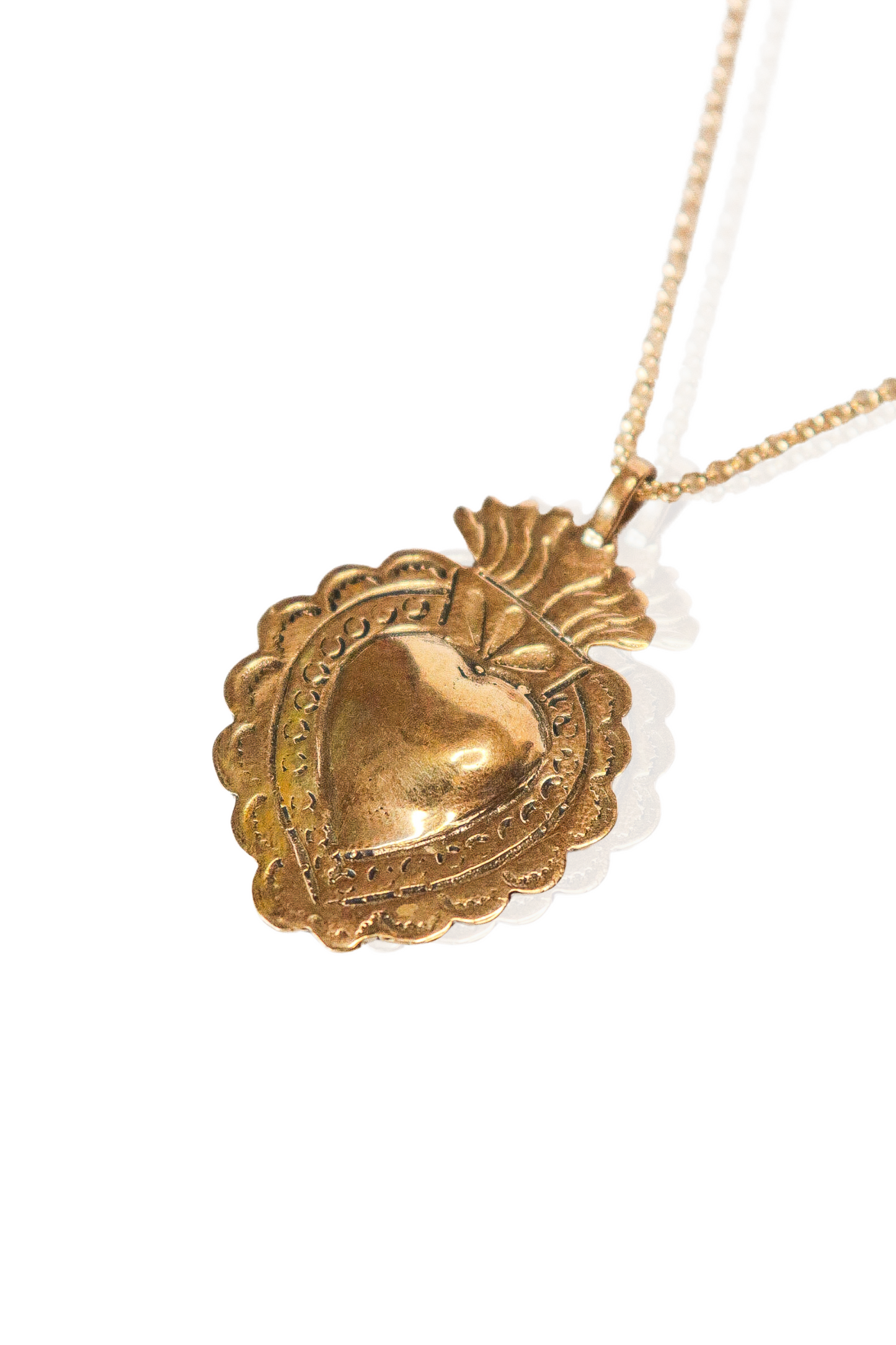 Boho gold faith necklace with sacred heart pendant