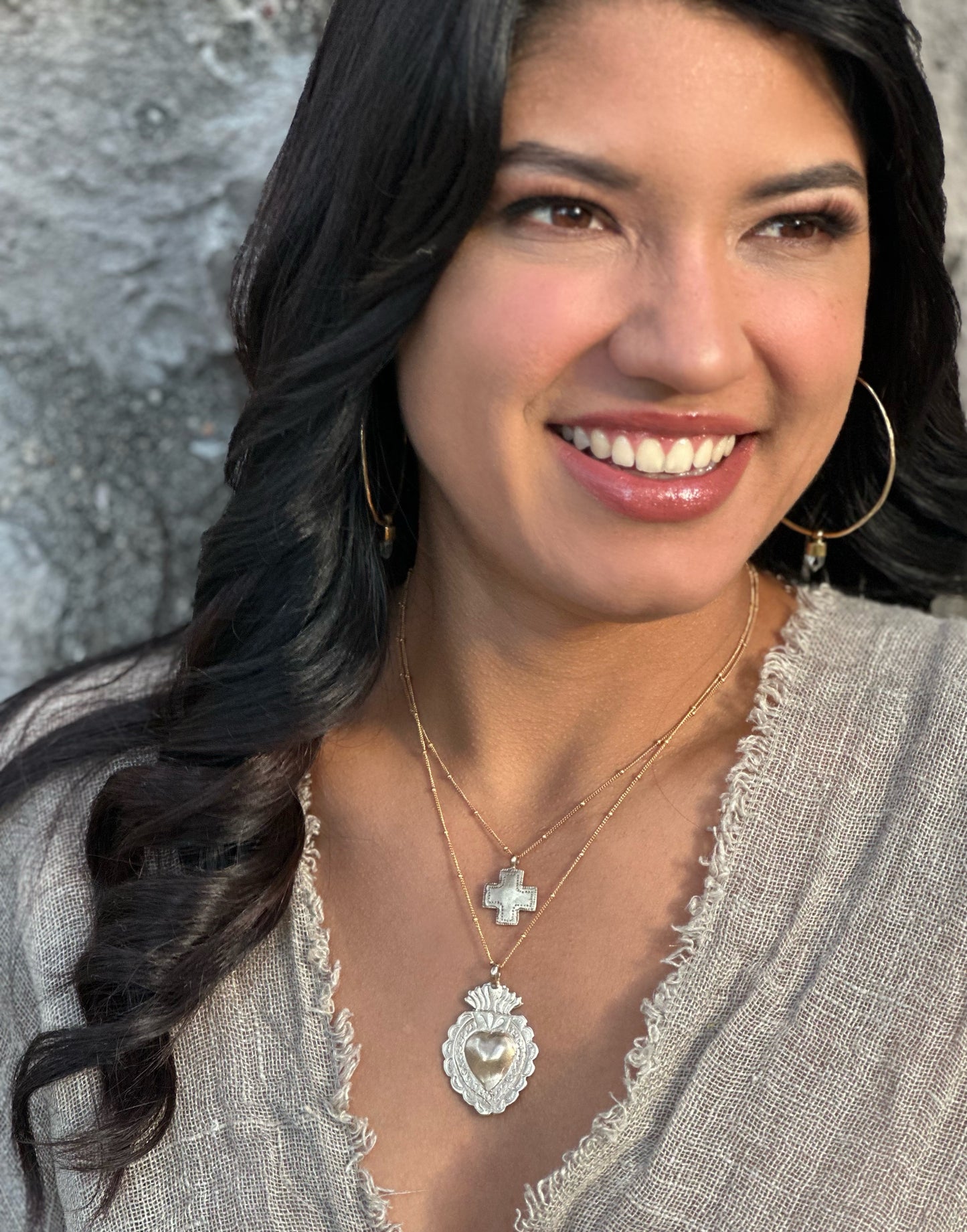 Sterling silver sacred heart pendant styled on model