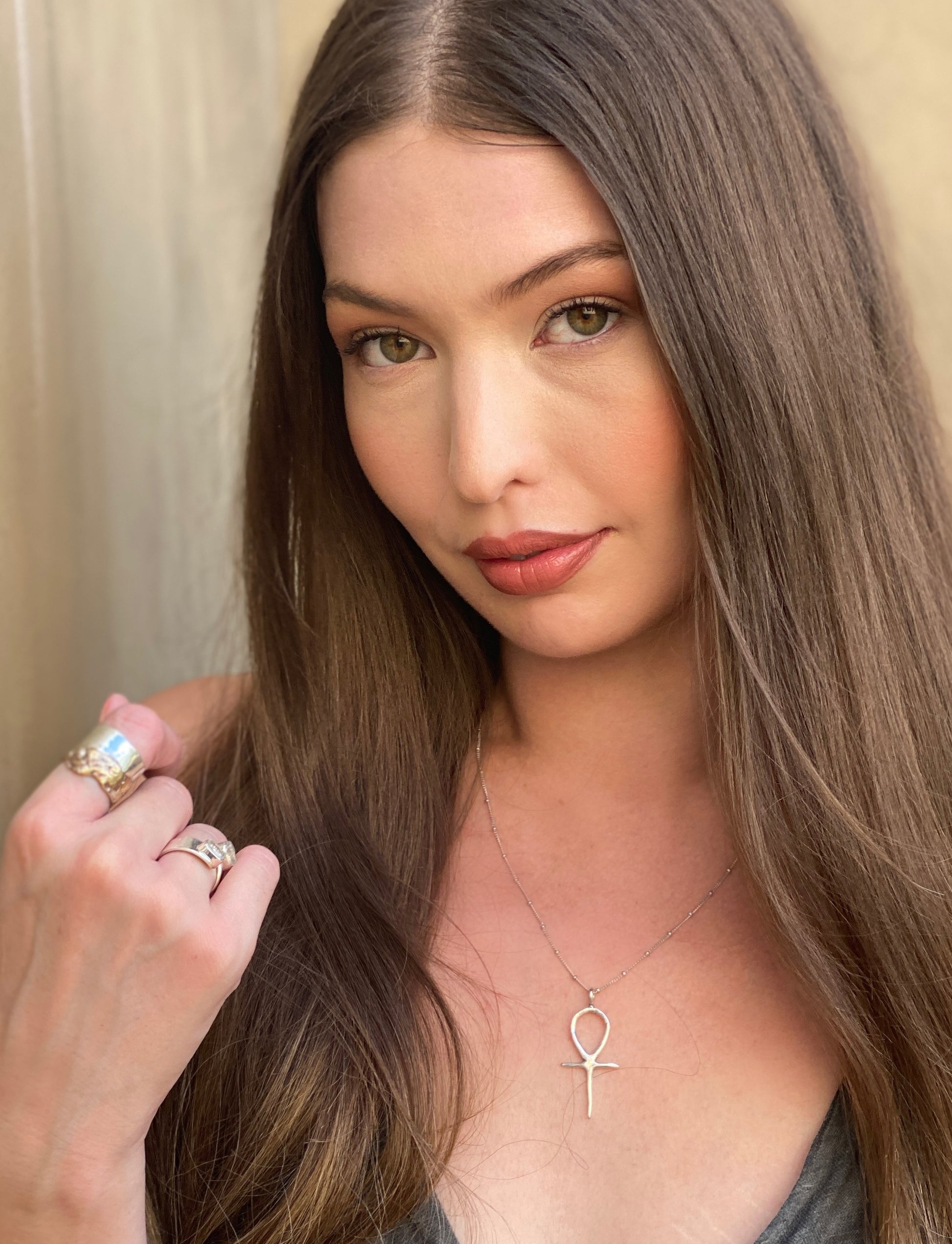 Silver Ankh necklace styled on model